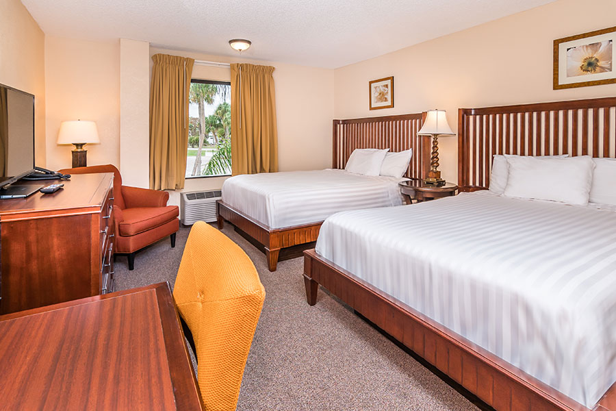 guest room with two queen beds