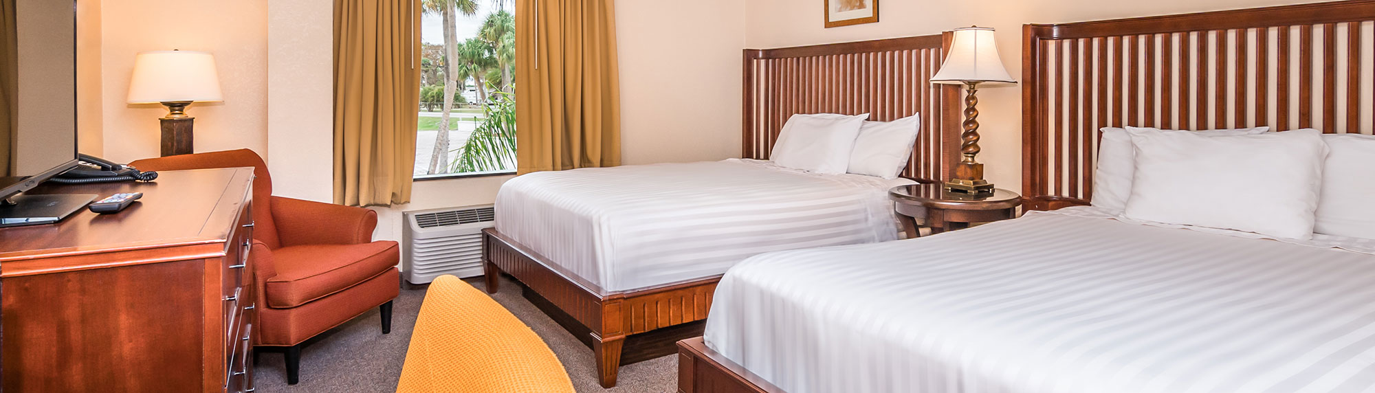 guest room with two queen beds