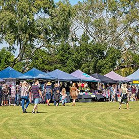 people attending an outdoor festival